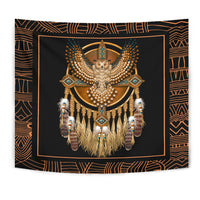 Close view dreamcatcher tapestry with golden owl, teal accents, and dangling feather strands