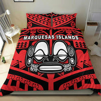 Red and black comforter with Marquesas Islands face mask print and matching pillow shams