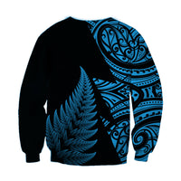 Unisex rugby sweatshirt, black with blue fern and large tribal circle print