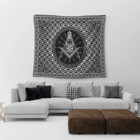 Black-and-white tapestry with square-and-compass Freemasonry crest in central circle