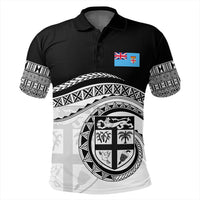 Black polo shirt with Fiji crest, flag patch, and tribal pattern sleeves
