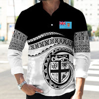 Black long-sleeve button shirt with large Fiji shield graphic and patterned cuffs