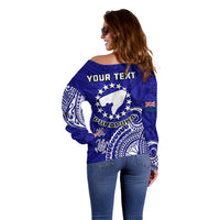 Blue off-shoulder sweater back with 'YOUR TEXT', star-and-turtle graphic