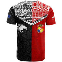Red/black T-shirt with Maori patterns, bird graphic, and crest patch on right side
