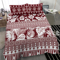 Red and white duvet cover with palm, floral, and tribal stripe patterns across panels
