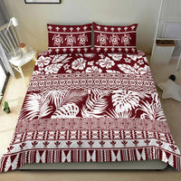 Red and white tropical print bedding set with matching pillow cases and layered bands