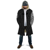 Black unisex hooded cloak on model, open front with white raven sleeve artwork