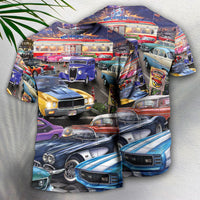 Classic car collage T-shirt with red, blue, and purple vintage vehicles, short sleeves.