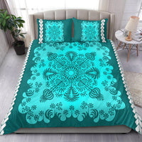 Turquoise bedding set with teal mandala and floral swirl pattern, two matching pillowcases