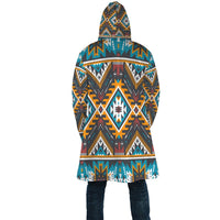 Back view of multicolor aztec geometric print hooded cloak, flared hem
