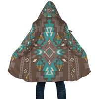 Close back view of hooded cloak with teal, brown and tan geometric print