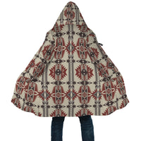 Geometric seamless cloak close-up: hood and flowing hem, multicolor tribal design