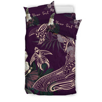 Purple duvet with tropical Aumakua graphic and “Your Text” on the pillow
