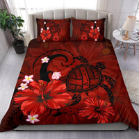 Red bedding set print of black turtle, hibiscus flowers and plumeria blossoms; 2 pillows