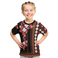 Black tapa-style kids T-shirt with floral print, short sleeves and crew neck
