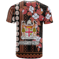 Black tapa-style T-shirt with floral print and crest scene; CUSTOM TEXT graphic