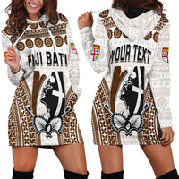 White hoodie dress with brown tribal tapa-style print, kangaroo pocket and hood