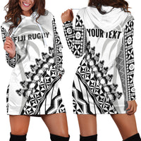 White hoodie dress with black geometric tribal print, hooded neckline, long sleeves