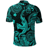 Turquoise polo with dark base, shark and circular Polynesian patterns on back, short sleeves