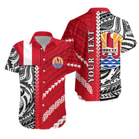 Red Hawaiian shirt with Polynesian pattern, short sleeves, button front and crest on chest