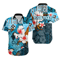 Hawaiian short-sleeve shirt in blue with white/red flowers and tropical print