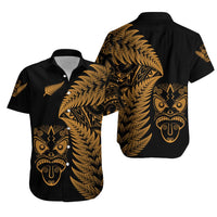 Unisex short-sleeve button shirt, black with gold fern and tribal mask graphic