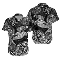 Black short-sleeve button-up shirt with white Polynesian tribal bird and wave pattern
