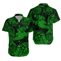 Green and black button-up Hawaiian shirt with Polynesian hammer shark pattern, short sleeves
