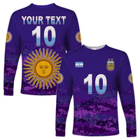 Purple long-sleeve football shirt with number 10, custom text, and sun emblem