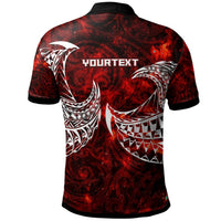 Red polo back view with black trim and large Polynesian bird/tribal graphic