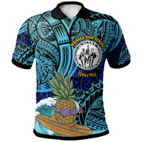 Blue polo shirt with black collar, Polynesian tiki surfer graphic and school crest on chest