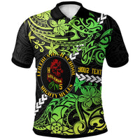 Black polo shirt with green floral tribal graphic and circular school emblem, front view