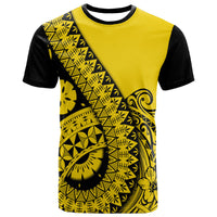 Gold and black graphic t-shirt with diagonal tribal pattern and floral motifs