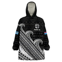 Unisex black hoodie blanket with tribal tapa pattern, large white graphic and hood