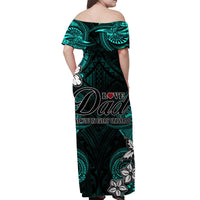 Back view: turquoise Dad off-shoulder maxi dress with Polynesian floral pattern
