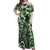 Green off-shoulder long dress with turtle print and white hibiscus flowers