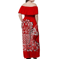 Red long off-shoulder dress with wide ruffle sleeves and white floral pattern, back view
