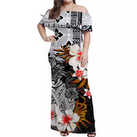 Black off-shoulder long dress with tropical floral print, short sleeves and fitted skirt