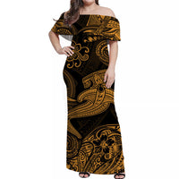 Black off-shoulder maxi dress with gold swirling motifs, short sleeves