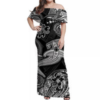 Black off-shoulder maxi dress with white wave swirls and flower motifs