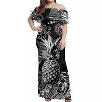 Black off-shoulder long dress with pineapple print, flowing short sleeves