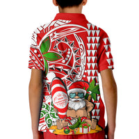 Kids red beach polo shirt with colorful holiday Santa graphic on the back.