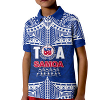 Kids blue rugby polo shirt with white tribal pattern and crest graphic on front