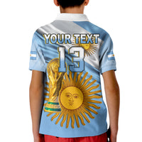 Kid football polo shirt, light blue with white collar, 'YOUR TEXT' 13 on back, gold sun print