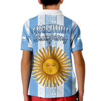 Kids Argentina football polo shirt with back graphic sun and "Argentina Champions" text.