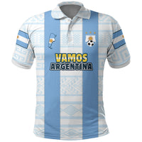 Polo infantil azul con panel a rayas, logo AFA y texto VAMOS ARGENTINA
