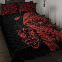 Black quilt bed set with red tribal face and fern leaf pattern, quilted diamond texture