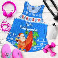 Flat-lay blue racerback tank with Santa surfing holiday graphic and snowflakes
