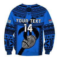 Blue rugby sweatshirt back with tapa patterns and large number 14 graphic