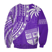 Purple crewneck sweatshirt with geometric tribal print and white FIJI emblem on back